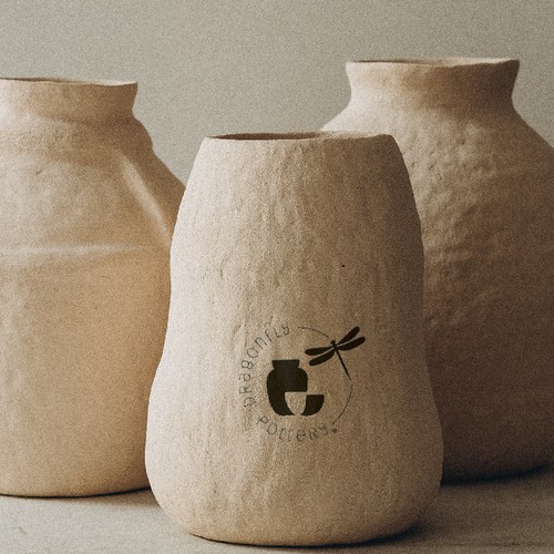 Clay logo with the title 'Dragonfly Pottery'