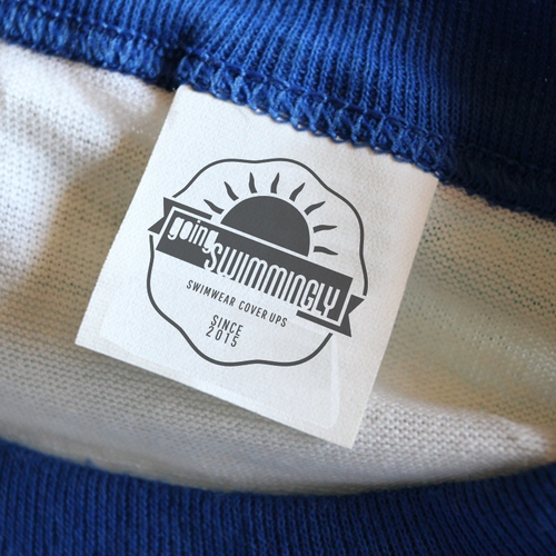 Hanger logo with the title 'Going Swimmingly brand logo'