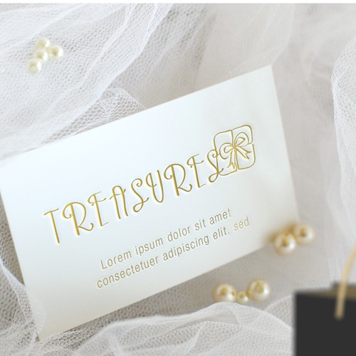 Jewelry logo with the title 'declined logo proposal for Treasures Giftshop'