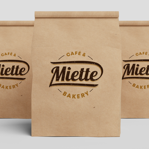 Cafe brand with the title 'Miette Bakery, rustic sourdough bread need industrial, bold logo'