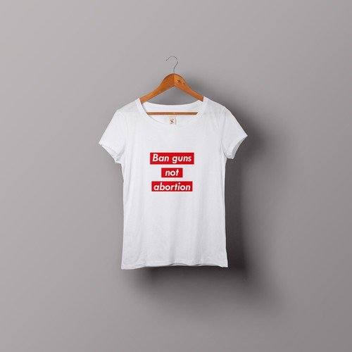 Visual design with the title '"Ban Guns, Not Abortion" t-shirt to speak up for women's rights.'