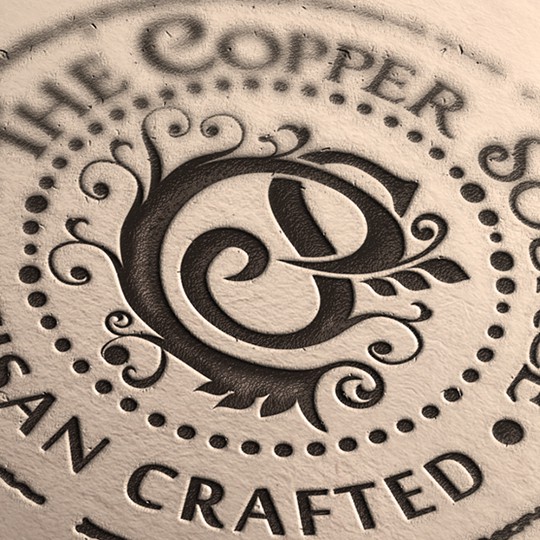 Decorative logo with the title 'Handmade artisan products made from copper'