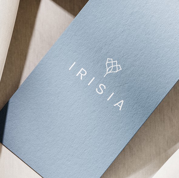 Floral design with the title 'Irisia – Logo Design'