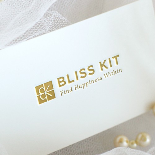 Gift box design with the title '[Logo only] New Curated Wellness Box from LA Yoga needs memorable logo/brand'