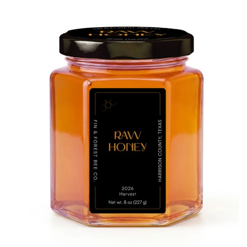 Honey label with the title 'Modern black and gold label for honey'