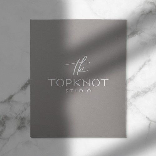 Hair logo with the title 'TopKnot Studios'