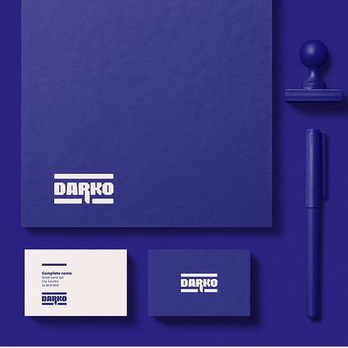 Stationery logo with the title 'Darko, a new image for a strong construction company'