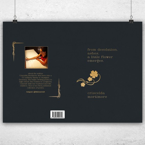Poetry book cover with the title 'from desolation ashes a little flower emerges'