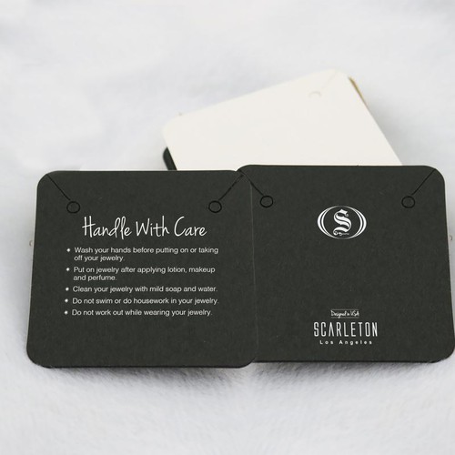 Winner label with the title 'Scarleton necklace packing'