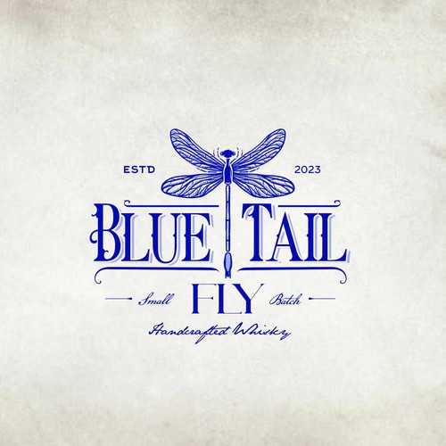 Dragonfly design with the title 'Blue Tail Fly - Handcrafted Whisky'