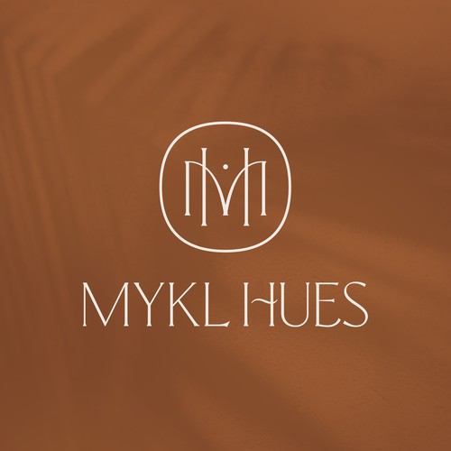Brown logo with the title 'Mykl Hues'