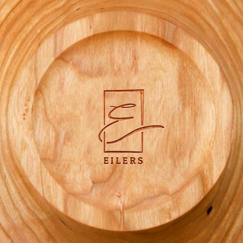 Quality logo with the title 'Elegant, hand-drawn logo for wood stamp'