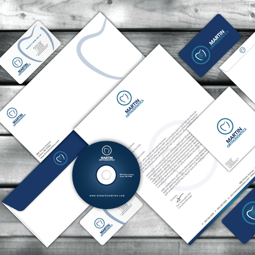 Envelope design with the title 'Stationery Set Proposal for 'Martin Orthodontics'.'