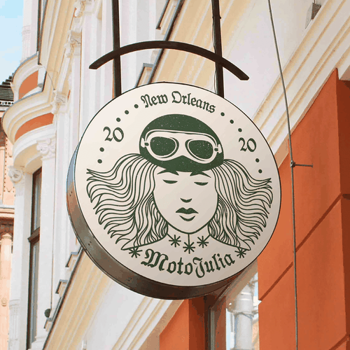 Woman face logo with the title 'Logo concept for MotoJulia – Motorcycle shop in New Orleans'