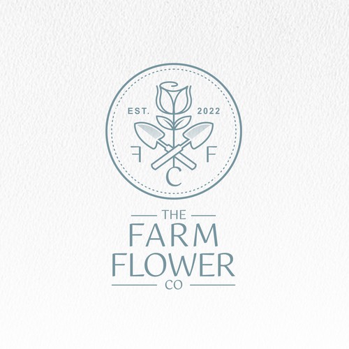 Shovel logo with the title 'The Farm Flower Company'