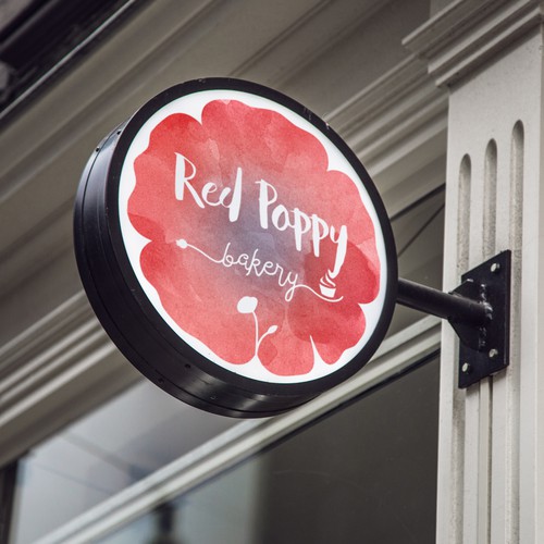 Cupcake logo with the title 'Logo design for "Red Poppy Bakery"'