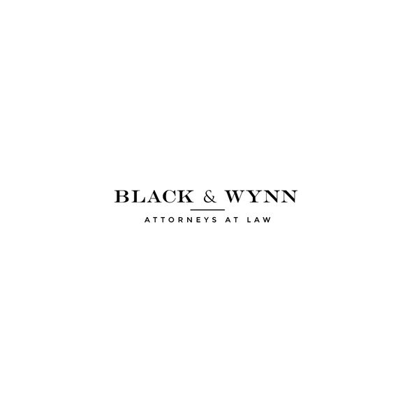 Lawyer logo with the title 'Black & Wynn - Attorneys At Law'