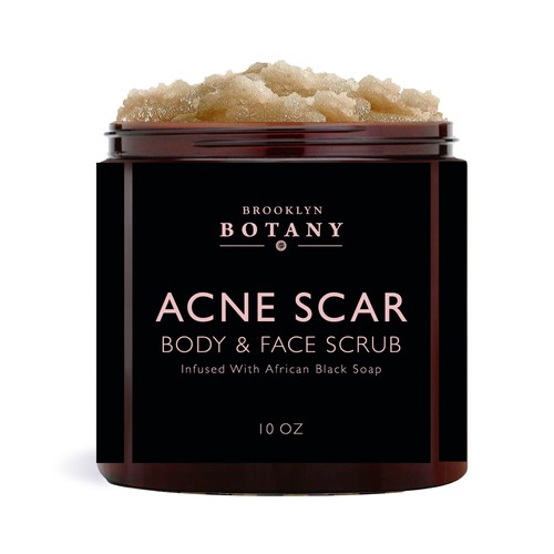 Skincare label with the title 'A VERSATILE SKIN CARE MUST HAVE! Our Acne Scar & Stretch Mark Body Scrub and Facial Scrub is made with all natural, African Black Soap, Shea Butter, and Coconut Oil '