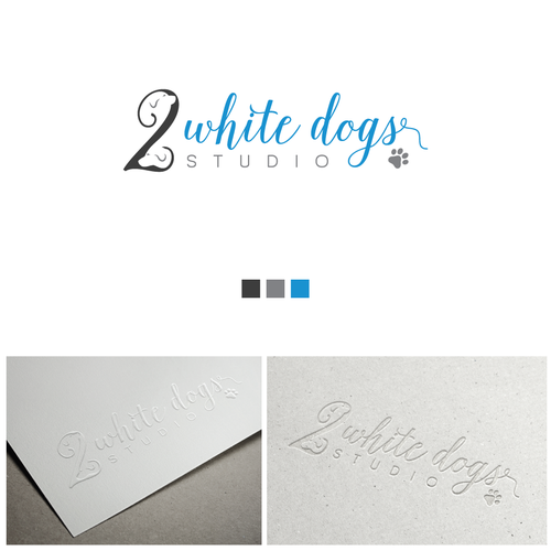 Dog logo with the title 'Two white dogs studio'