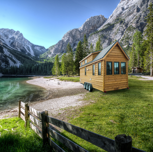 Photo manipulation artwork with the title 'Photoshopped wooden house'