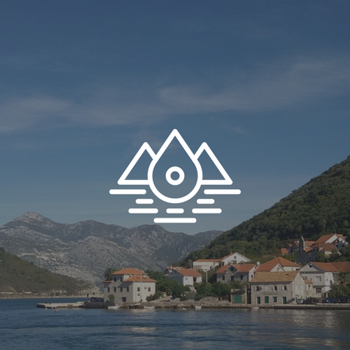 Mountain logo with the title 'Logo for a Real Estate & Travel Agency'