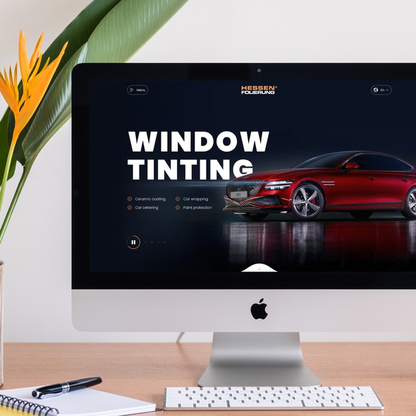 Desktop website with the title 'Redesign of a high-end website for Car Wrapping & Window Tinting'