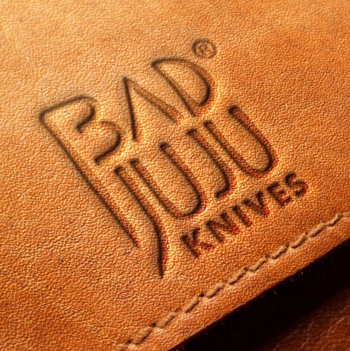 African design with the title 'Bad Ass Logo for Bad Juju Knives'