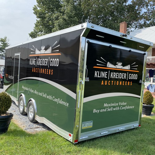 Trailer wrap design with the title 'Kline, Kreider & Good Auctioneers office trailer'
