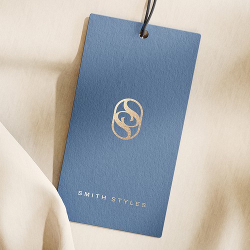 H&m logo with the title 'Elegant monogram design for an apparel brand'