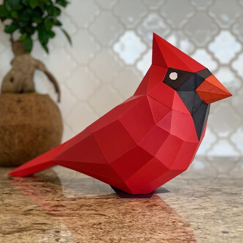 Low poly design with the title 'PaperCraft Bird Model'