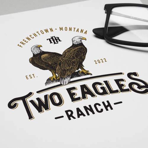 Black eagle logo with the title 'two eagles ranch'
