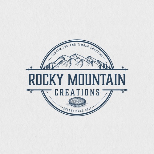 Log logo with the title 'Rocky Mountain Creations'