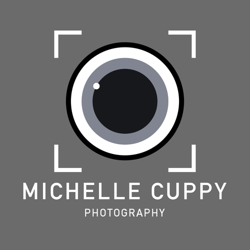 Lens logo with the title 'Michelle Cuppy Photography'