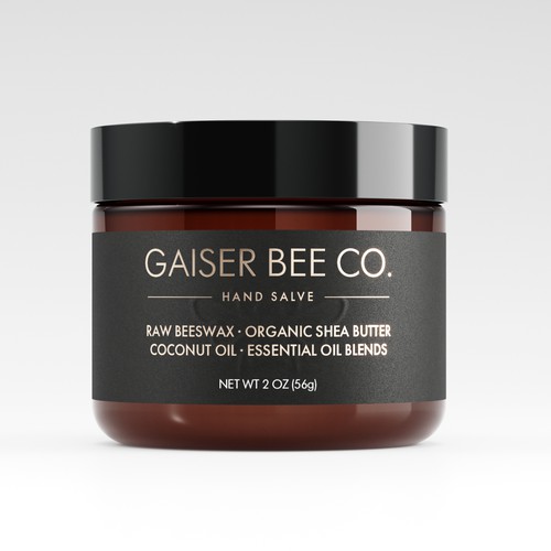 Gold packaging with the title 'Raw Beeswax Hand Salve Label Design Concept'
