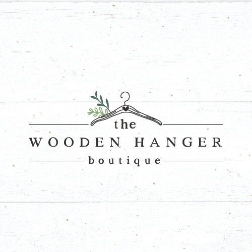 Farmhouse logo with the title 'The wooden hanger boutique'