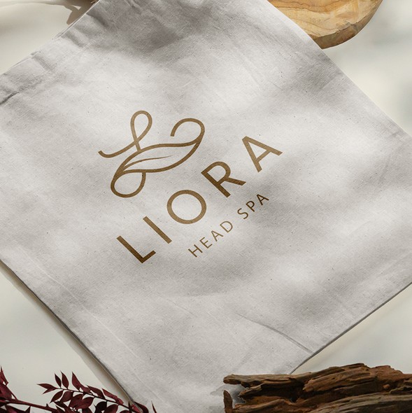 Organic logo with the title 'An elegant monogram design for a luxury spa brand'