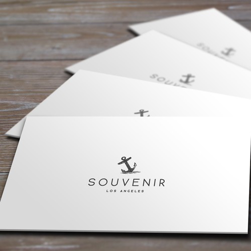 Store logo with the title 'Create a sophisticated, subtly vintage inspired logo for a new, super chic "department" store in Los Angeles.'