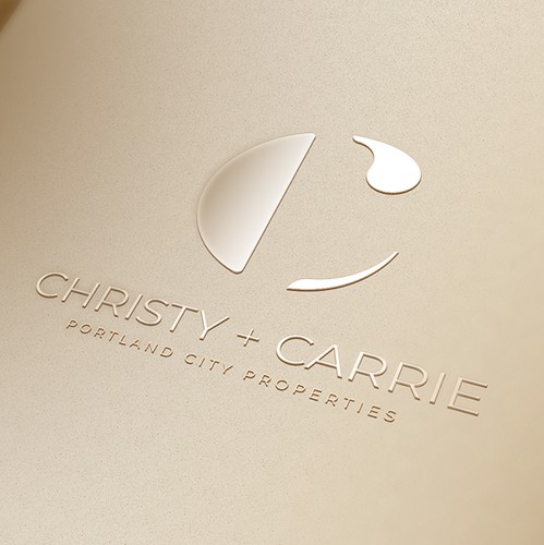 Typographic logo with the title 'Christy + Carrie, Portland City Properties'