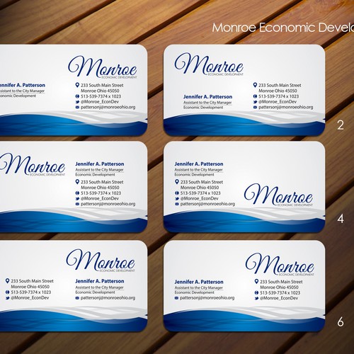 Swoosh design with the title 'Monroe Economic Development'