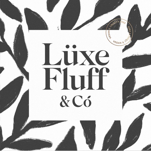 Black and gold logo with the title 'Custom Wordmark and Lettermark for Lüxe Fluff & Co'