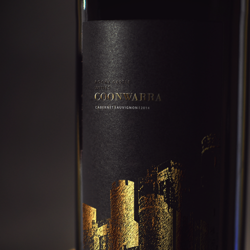 Wine bottle design with the title 'b l a c k & g o l d'