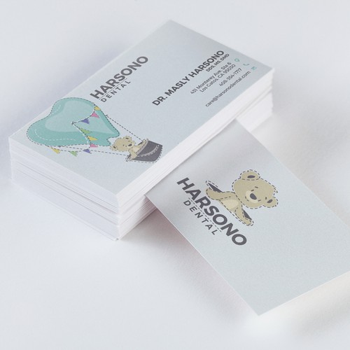 Tooth design with the title 'Identity / Business card design for Harsono Dental'