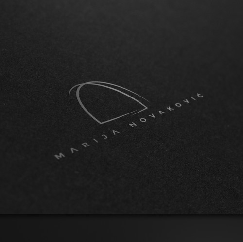 Tooth logo with the title 'Marija Novakovic aesthetic dentist'