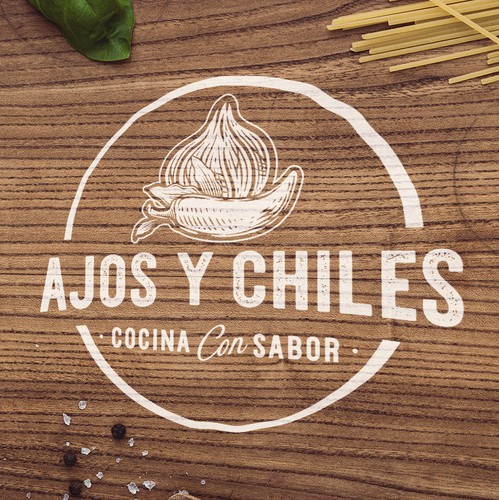 Spice logo with the title 'Ajos Y Chiles'