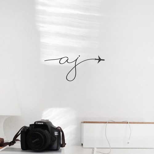 Flying design with the title 'Logo for a travel photographer'