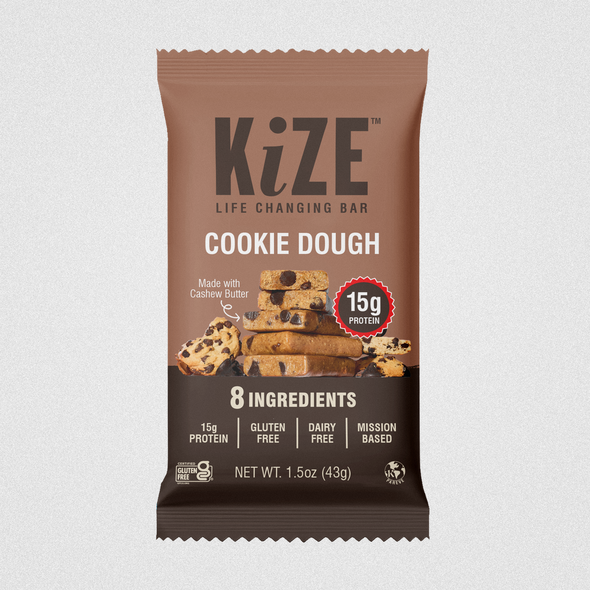 Brown packaging with the title 'KiZE PLUS PROTEIN 60g Cookie Dough package'