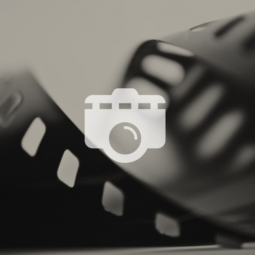 Video production logo with the title 'camera + film roll '