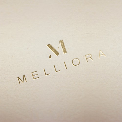 Gold jewelry logo with the title 'Minimalistic monogram based logo design for a jewelry online store'