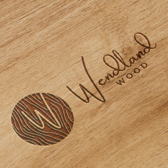 Wood logo with the title 'Modern/elegant logo for unforgettable wooden furniture made from local woods'