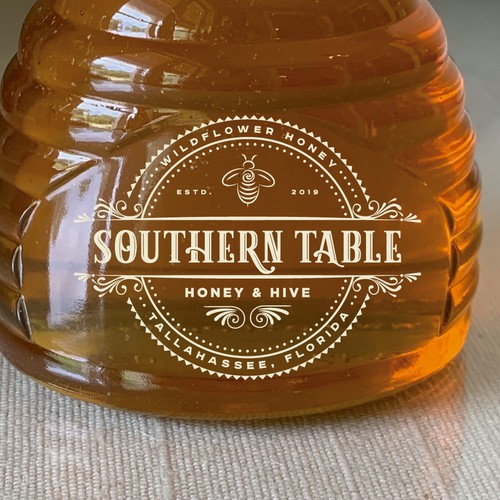 Bee design with the title '#SavetheBees Organic Honey Company logo'